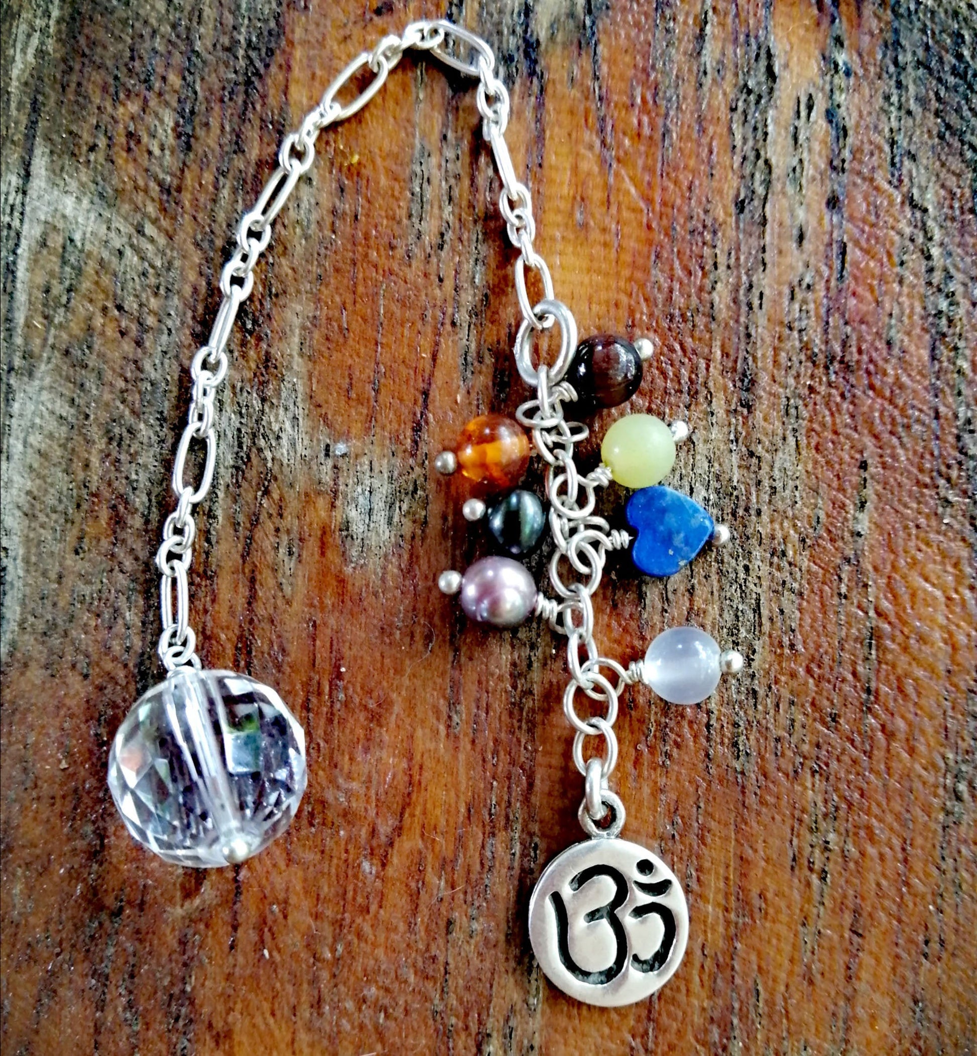 7 Gem Chakra Pendulum with Om on a Silver Chain - SaraCura Spirit